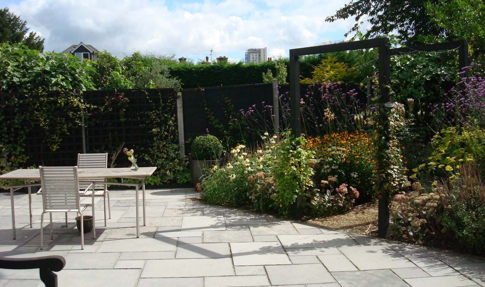 A long, narrow garden design in Woking, Surrey.