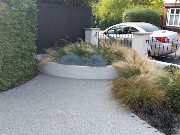 Front garden design in Woking Surrey with resin driveway